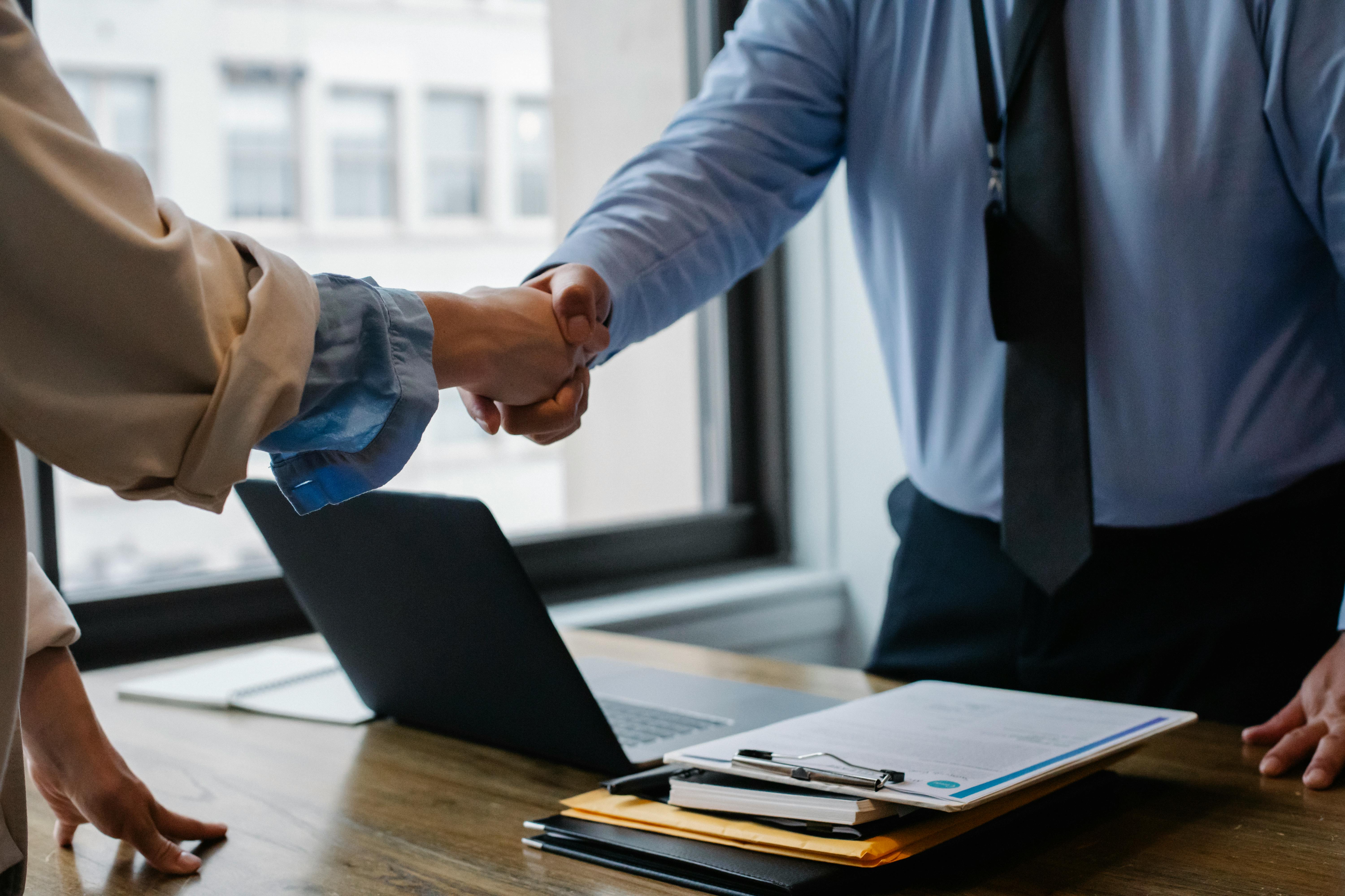 Business partners shaking hands